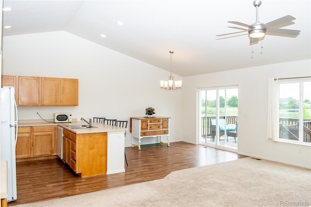 1766 Country Sun Dr, Windsor, CO 80550 - kitchen with white appliances, a peninsula, recessed lighting, light countertops, and dark carpet