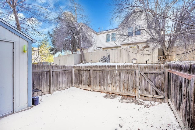 view of yard covered in snow