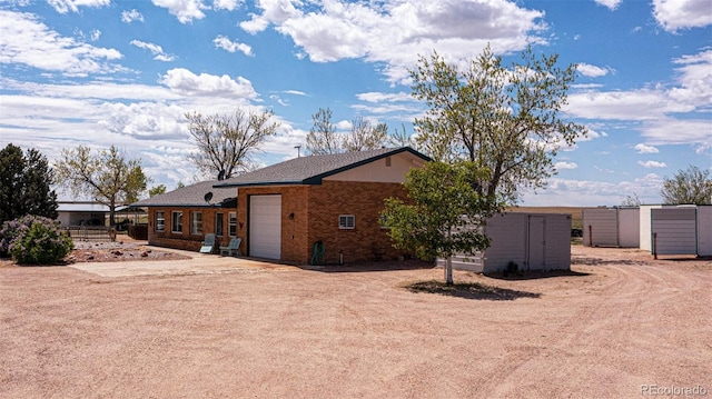 exterior space with a garage