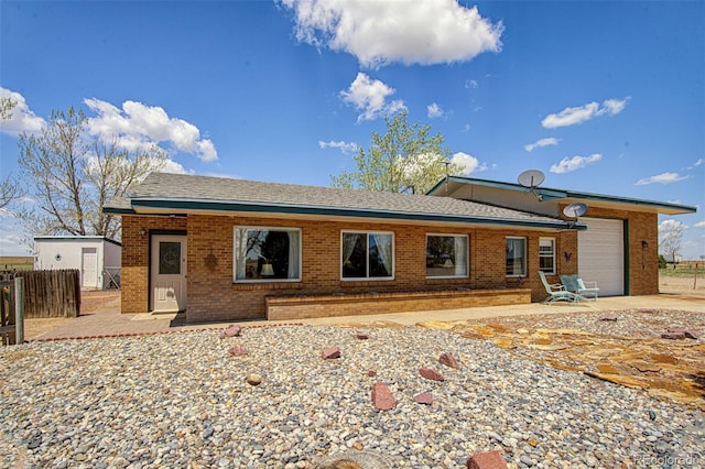 back of house with a garage