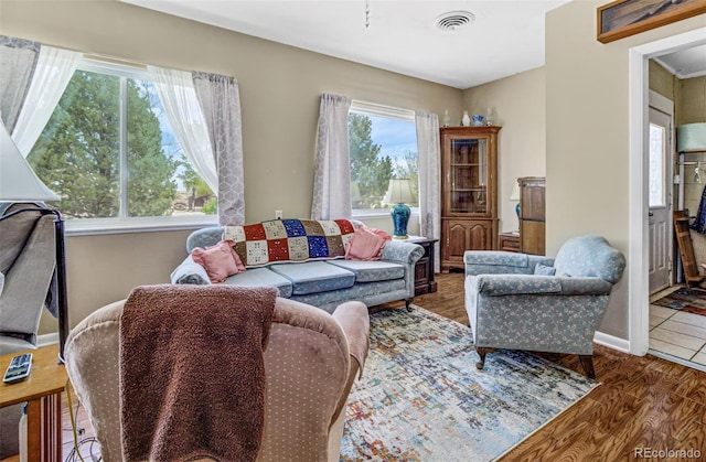 living room with dark hardwood / wood-style floors