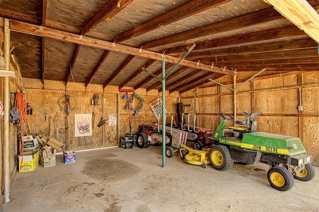 garage with wood walls