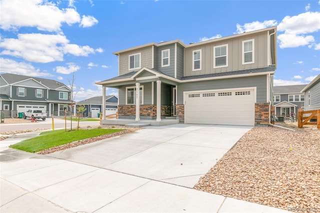 view of front of property featuring a garage and covered porch