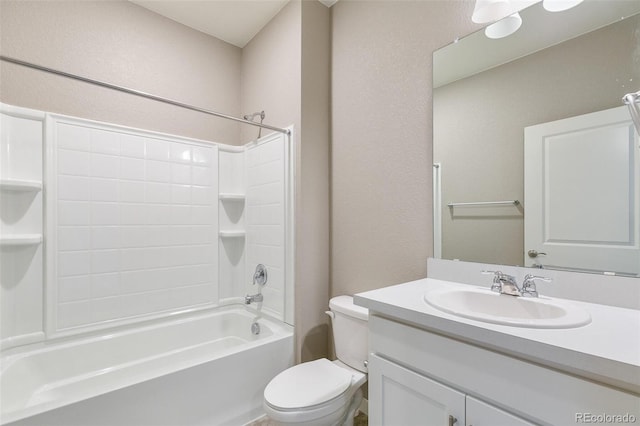 full bathroom with washtub / shower combination, vanity, and toilet