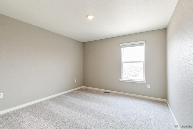 empty room featuring carpet