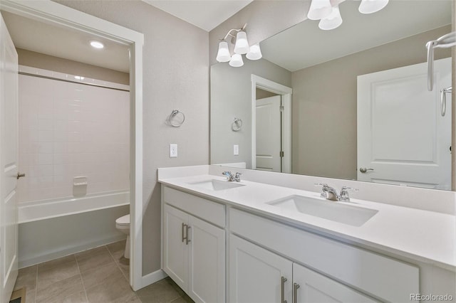 full bathroom featuring tile patterned floors, vanity, toilet, and bathing tub / shower combination