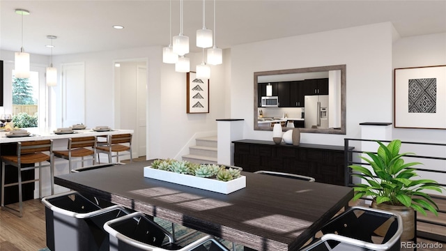 dining room with hardwood / wood-style floors