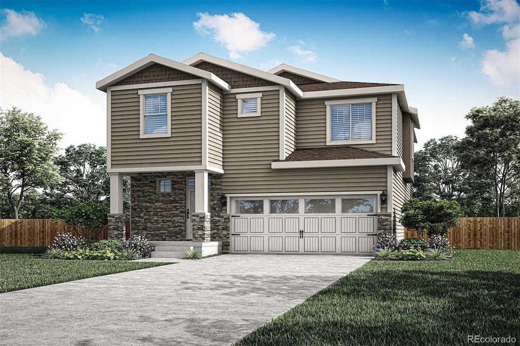 view of front of home with a garage and a front lawn