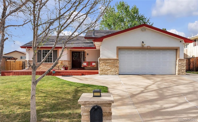 view of front of home featuring fence, stone siding, and stucco siding
