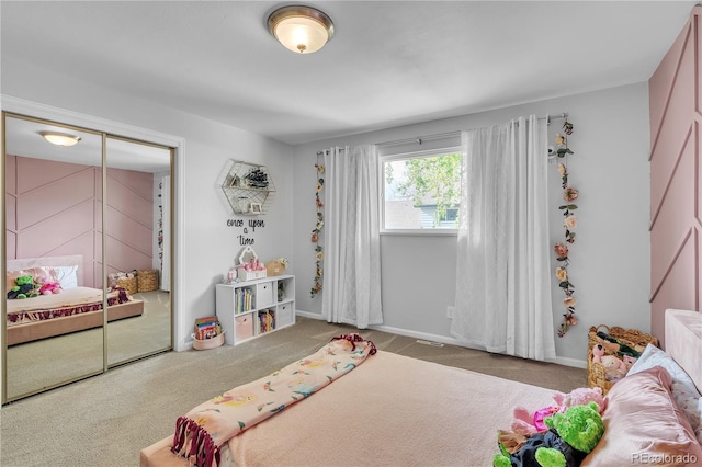 bedroom featuring carpet floors and baseboards