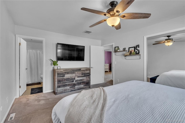 bedroom with visible vents, carpet flooring, baseboards, and a ceiling fan