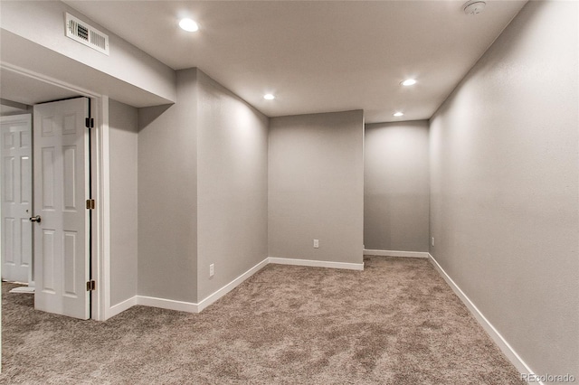 basement with carpet flooring