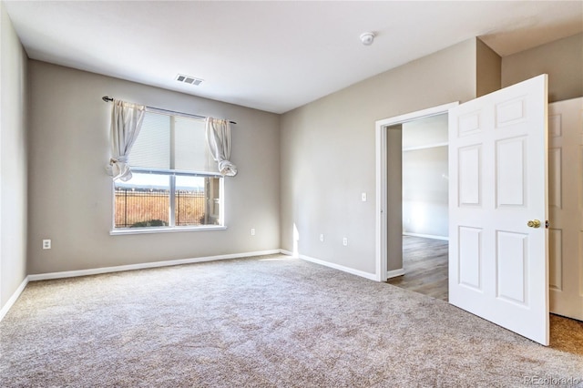 view of carpeted spare room