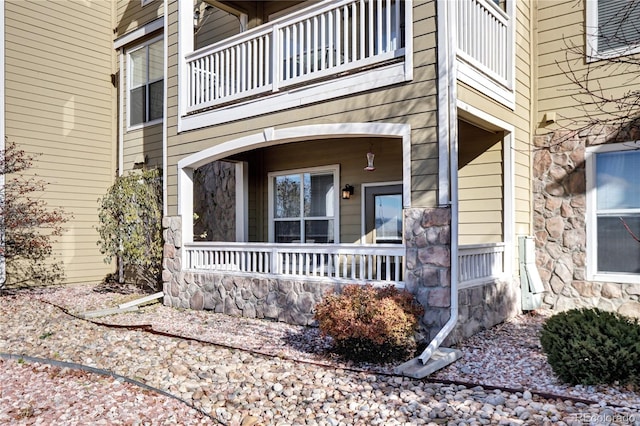 property entrance with a balcony