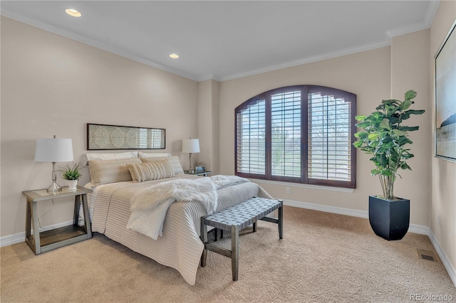 bedroom featuring baseboards, recessed lighting, crown molding, and light carpet