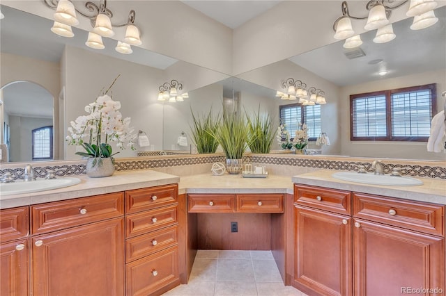 full bath with vanity and tile patterned flooring