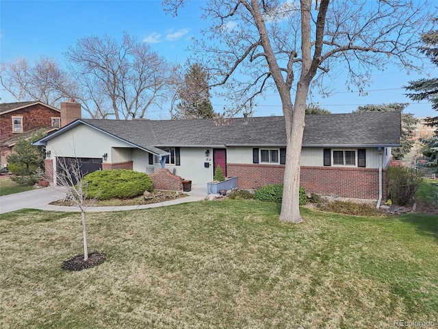 ranch-style house with concrete driveway, roof with shingles, a front lawn, an attached garage, and brick siding