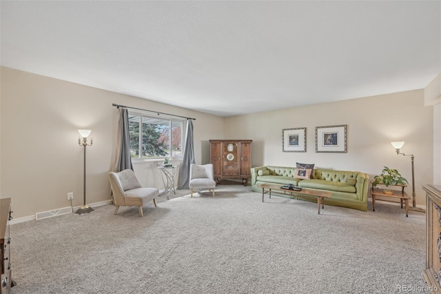 unfurnished living room with carpet flooring, baseboards, and visible vents