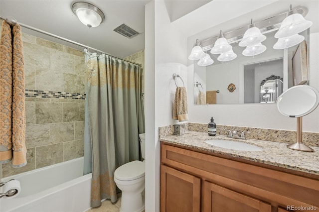 bathroom with visible vents, toilet, shower / bathtub combination with curtain, and vanity