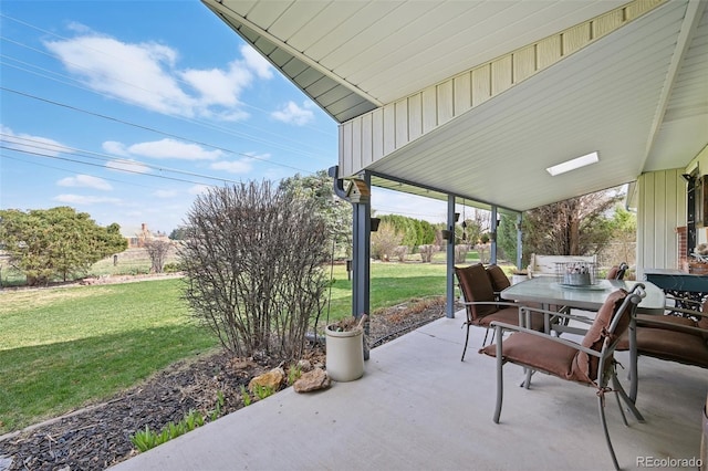 view of patio featuring outdoor dining area