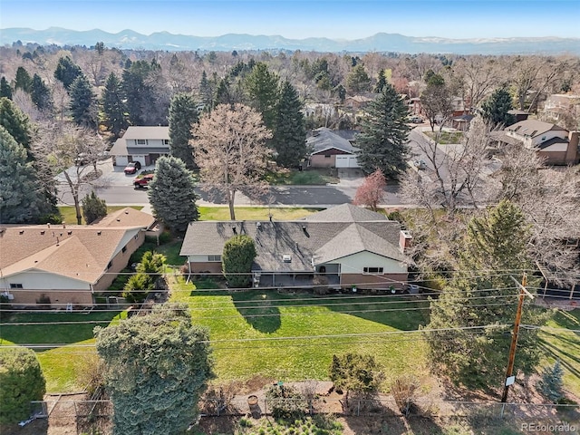 drone / aerial view with a mountain view and a residential view
