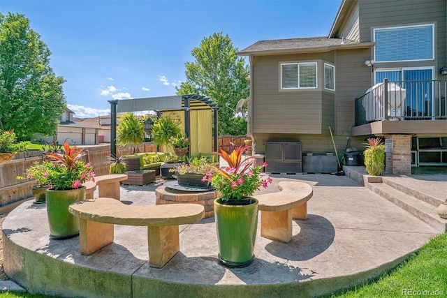 view of patio with outdoor lounge area and a pergola