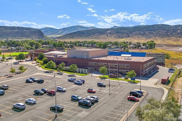 birds eye view of property featuring a mountain view