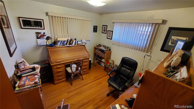 office area with wood-type flooring