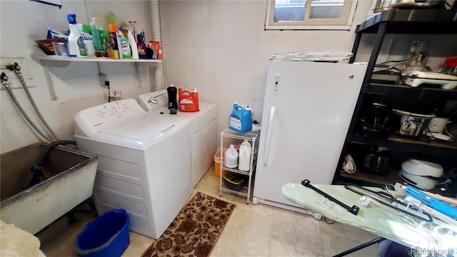 laundry room featuring washer and dryer