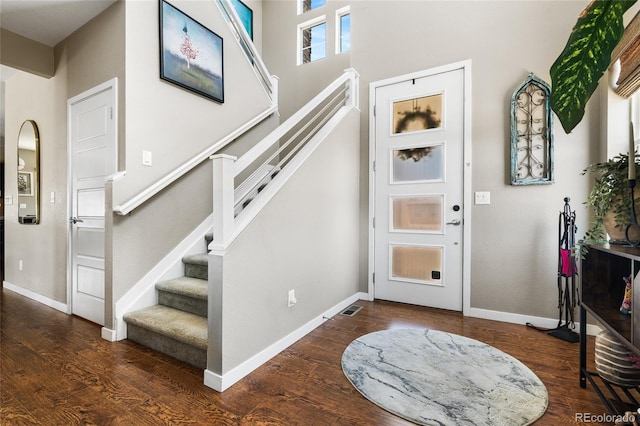 14110 Pastel Ln, Parker, CO 80134 - foyer entrance featuring stairway and wood finished floors