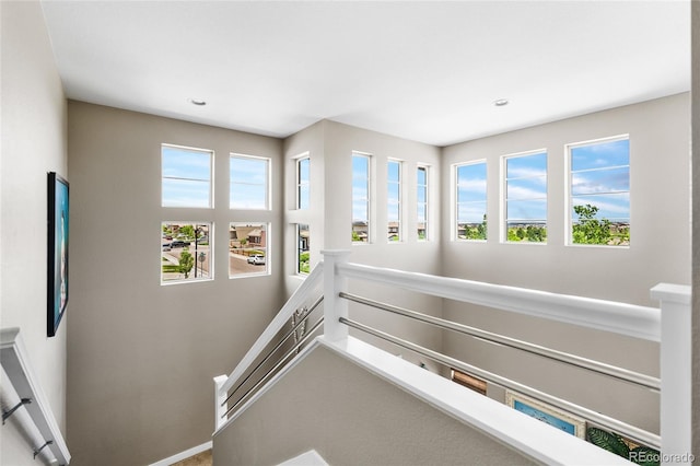 14110 Pastel Ln, Parker, CO 80134 - staircase featuring baseboards and recessed lighting