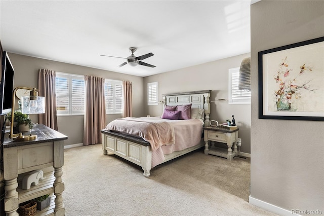 14110 Pastel Ln, Parker, CO 80134 - bedroom with multiple windows, light carpet, and ceiling fan