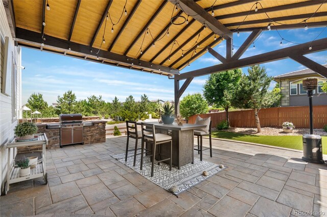 14110 Pastel Ln, Parker, CO 80134 - view of patio / terrace featuring exterior kitchen and a gazebo