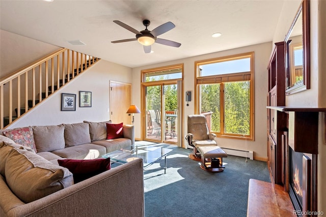 1508 Berino Ct Unit C, Frisco, CO 80443 - living room featuring baseboard heating, a ceiling fan, carpet floors, and stairs