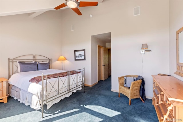 1508 Berino Ct Unit C, Frisco, CO 80443 - carpeted bedroom with high vaulted ceiling, ceiling fan, and beamed ceiling