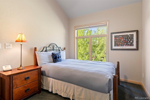 1508 Berino Ct Unit C, Frisco, CO 80443 - bedroom with dark carpet and lofted ceiling