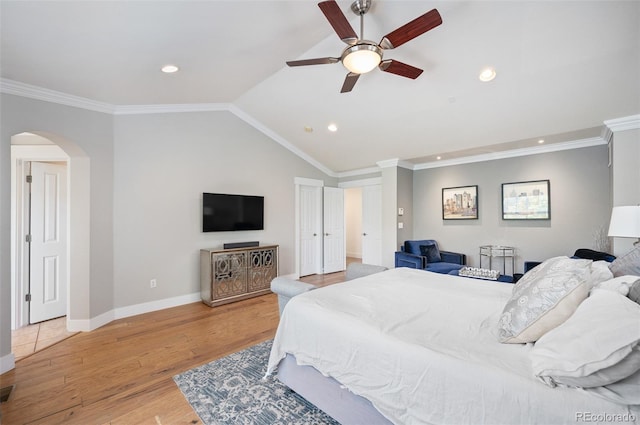 2746 Geneva St, Denver, CO 80238 - bedroom featuring arched walkways, light wood-style floors, recessed lighting, lofted ceiling, and ornamental molding