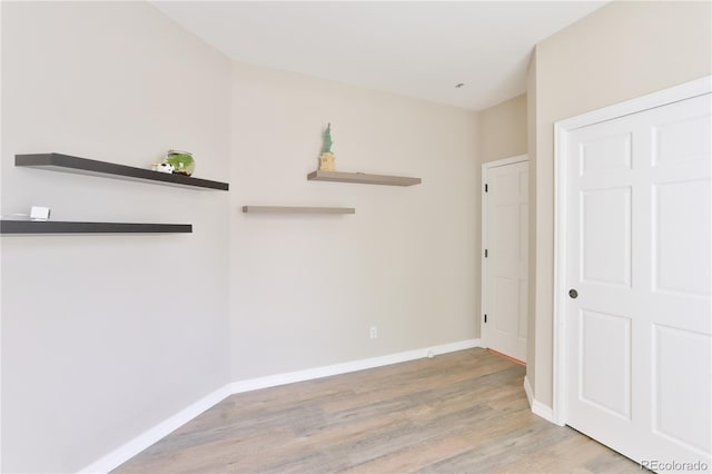19249 E Progress Ave, Centennial, CO 80015 - unfurnished bedroom featuring light wood finished floors and baseboards