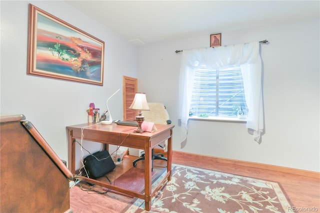 19249 E Progress Ave, Centennial, CO 80015 - home office with wood finished floors and baseboards