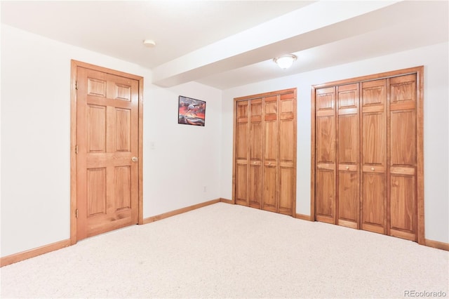 19249 E Progress Ave, Centennial, CO 80015 - unfurnished bedroom featuring two closets and carpet floors