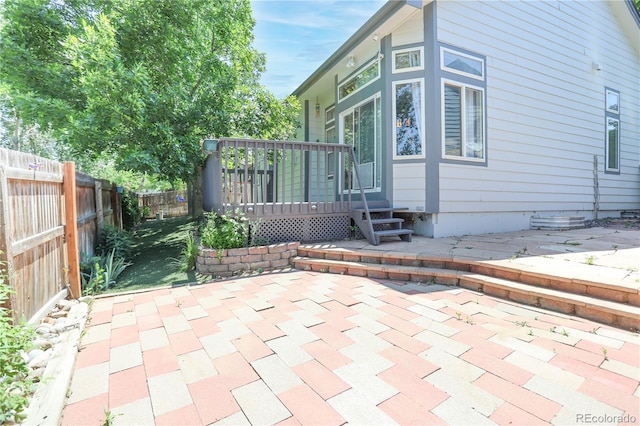 19249 E Progress Ave, Centennial, CO 80015 - view of home's exterior with a patio area, a fenced backyard, and a deck