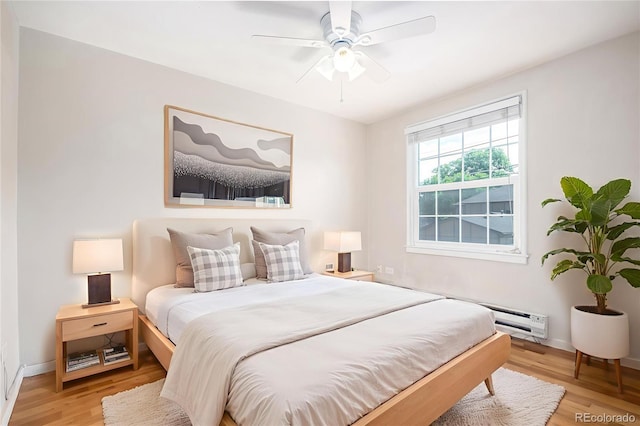 2856 Jasmine St, Denver, CO 80207 - bedroom featuring light wood finished floors, baseboards, and ceiling fan
