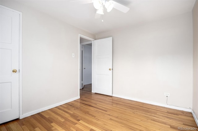2856 Jasmine St, Denver, CO 80207 - unfurnished room featuring light wood-style flooring, a ceiling fan, and baseboards