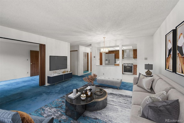 13890 E Marina Dr Unit 304, Aurora, CO 80014 - living area featuring a chandelier, carpet flooring, and a textured ceiling