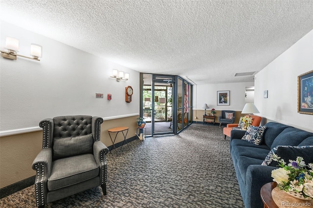 13890 E Marina Dr Unit 304, Aurora, CO 80014 - living room with baseboards, carpet, and a textured ceiling