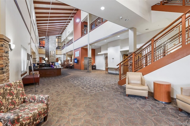 13890 E Marina Dr Unit 304, Aurora, CO 80014 - building lobby with a high ceiling, stairway, and recessed lighting