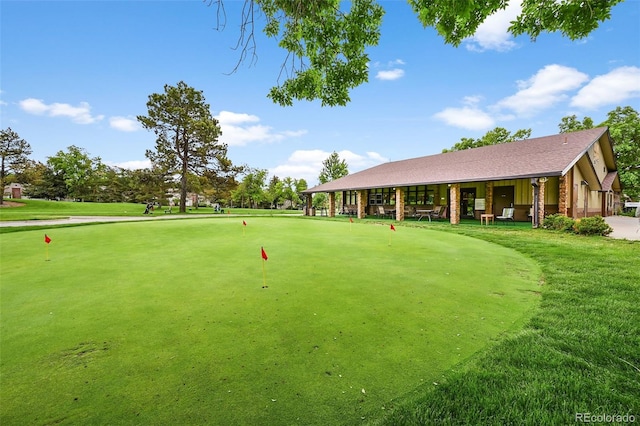 13890 E Marina Dr Unit 304, Aurora, CO 80014 - surrounding community featuring a putting green and view of golf course