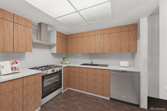 13890 E Marina Dr Unit 304, Aurora, CO 80014 - kitchen with stainless steel dishwasher, range with gas stovetop, a sink, wall chimney range hood, and dark wood finished floors