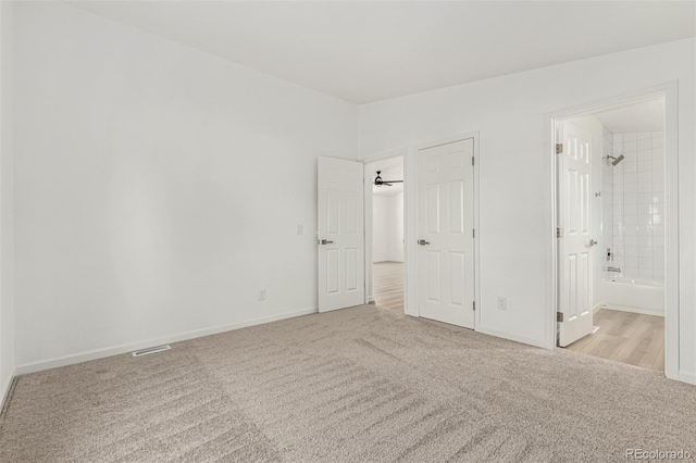 657 Locust Ave, Lochbuie, CO 80603 - unfurnished bedroom featuring carpet and connected bathroom