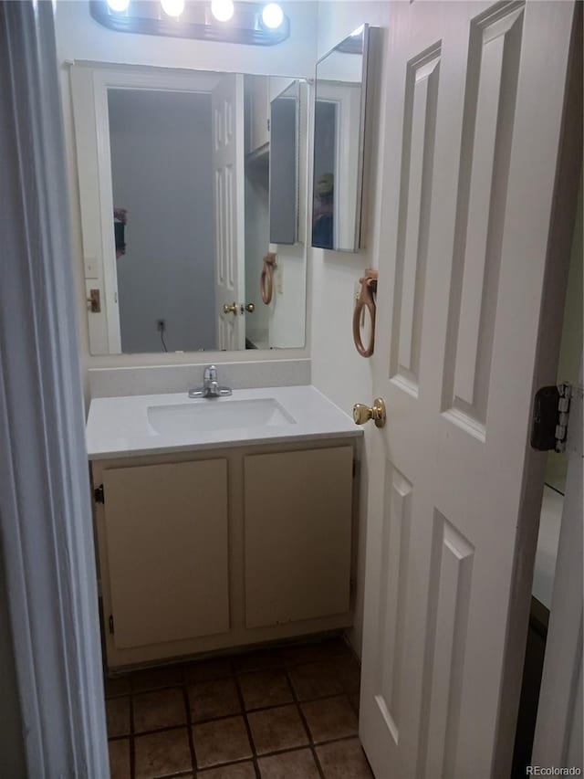 bathroom featuring vanity and tile patterned flooring